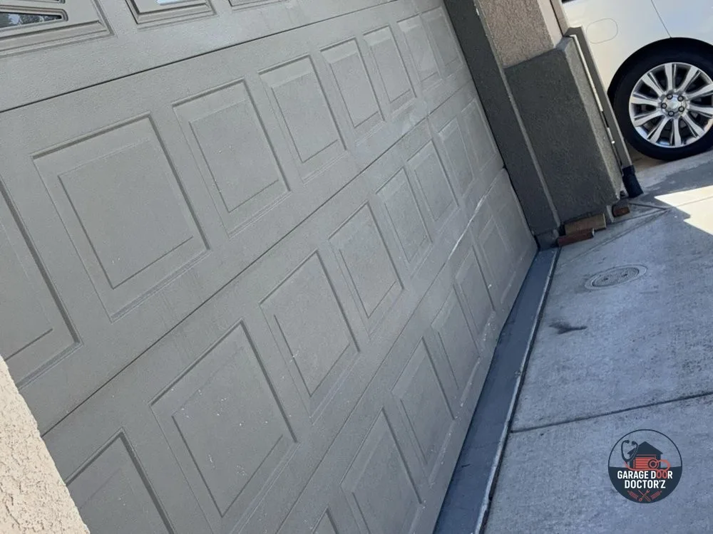 After: replacement sections hung flat and square - Garage Door Doctor'Z