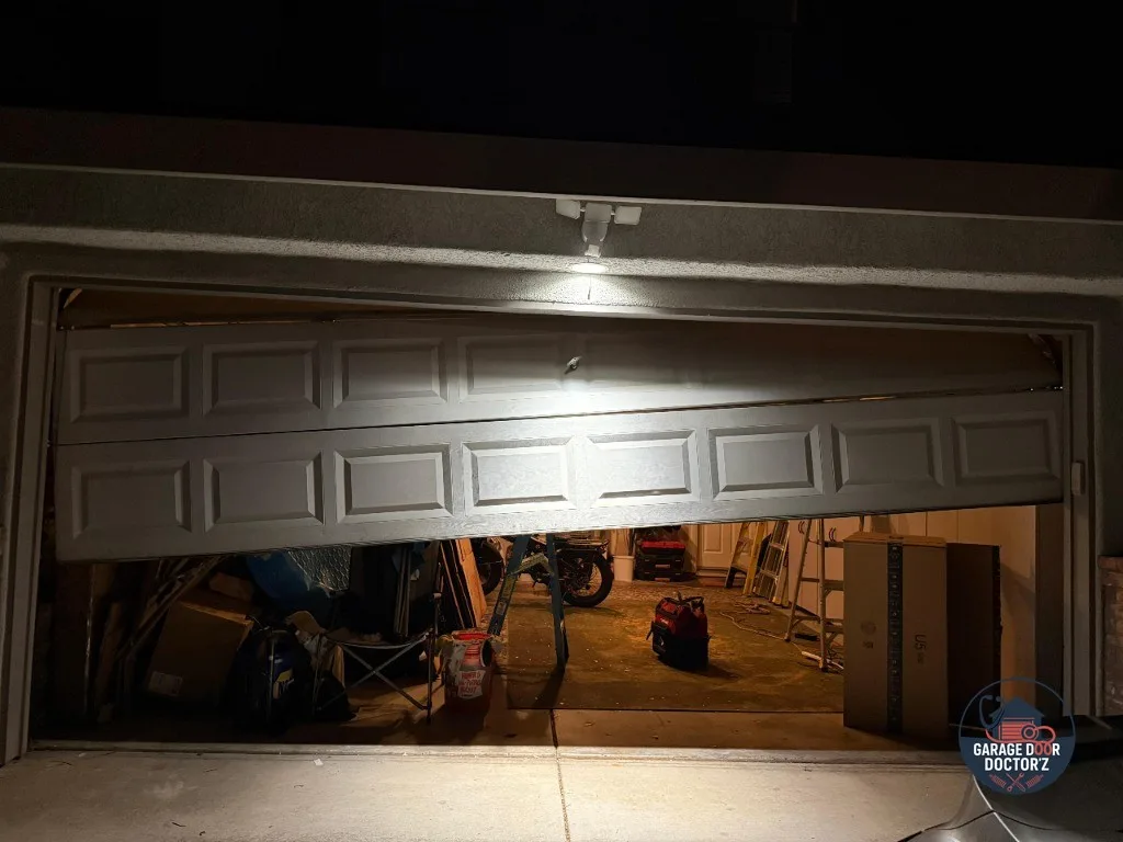 Before: garage door jumped its track and jammed part-way open